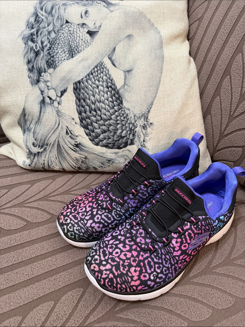 Skechers Black Leopard Print Slip-On Sneakers with Pink, Purple & Blue Accents